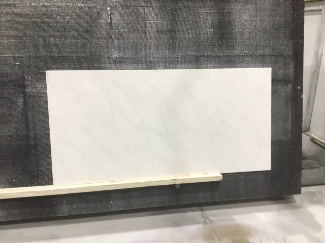 Q Quartz Calacatta Premata Quartz remnant, 60" x 29"
