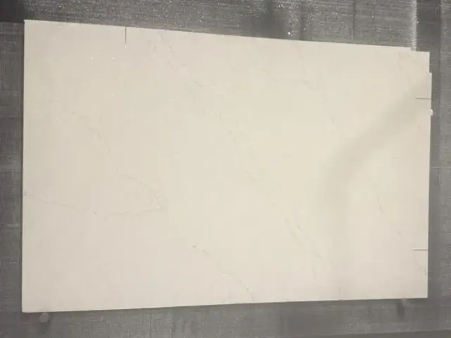 Calacatta Karmelo Quartz remnant, 75" x 48"