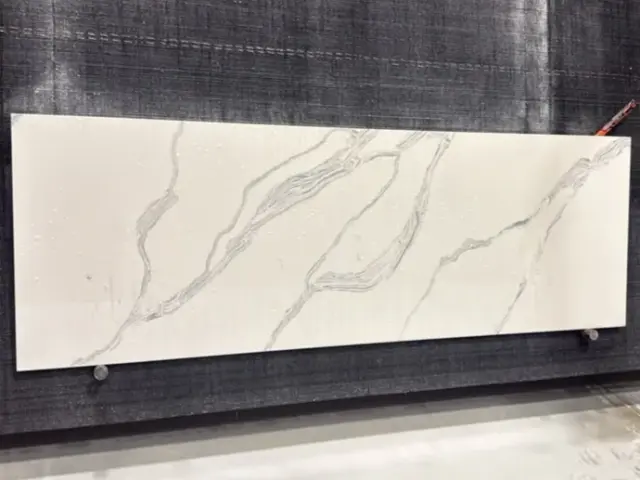 Calacatta Venato Quartz remnant, 85" x 28"