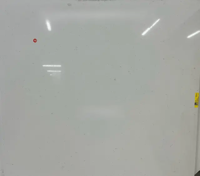 4141P Misty Carrara Quartz remnant, 55" x 50"