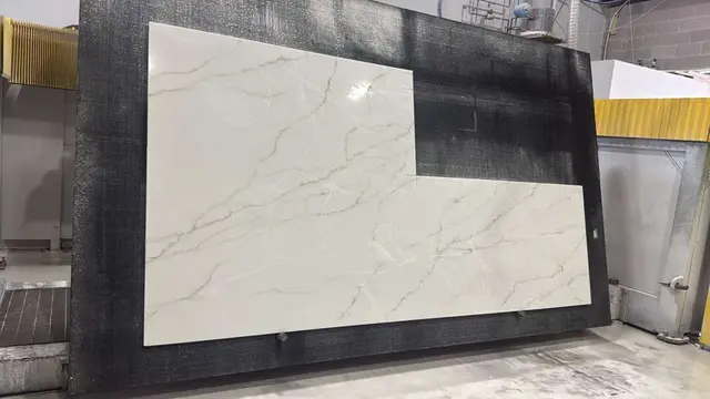 Calacatta Bolognia Quartz remnant, 126" x 32"