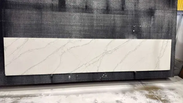 Calacatta Viraldi Quartz remnant, 138" x 28"