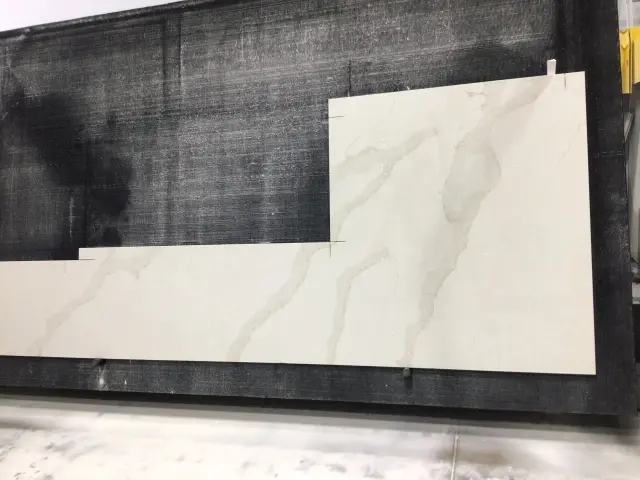 Blue Planet Calacatta Storm Gold Quartz remnant, 50" x 43"